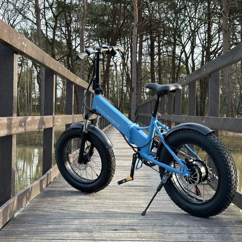 Emovement Pixie Folding Ebike parked on footbridge