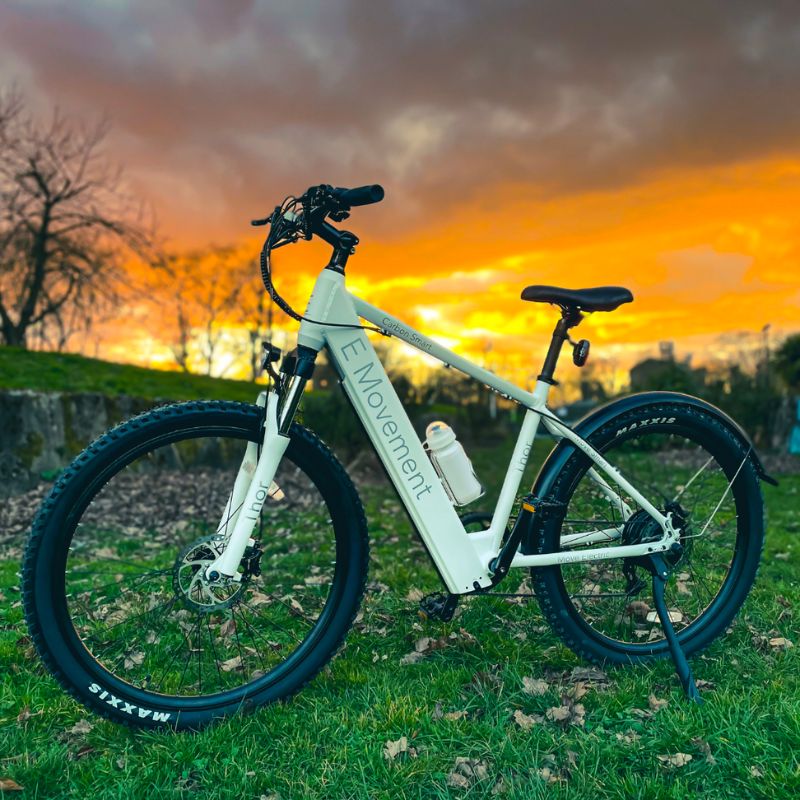 Emovement Thor eMTB white with sunset behind